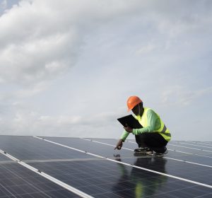 Technician engineer checks the maintenance of the solar cell panels.
